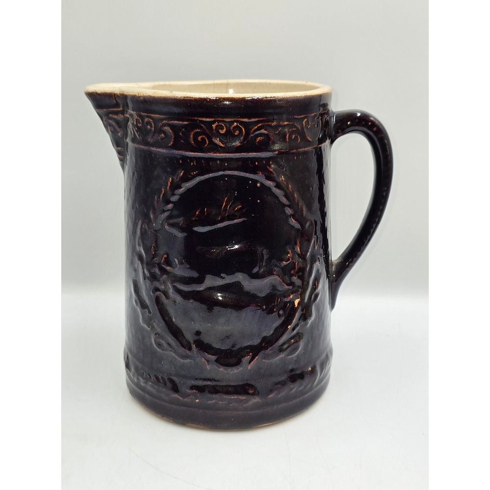 Vintage Stoneware Pitcher Brown Albany Slip Glaze Relief Wreath Deer Design